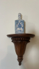 Wall Sconce, Ceramic Decanter and Cast Iron Pediment