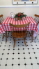 Table with Red Checkered Covering, Kitchen Decor, Decorative Window Hanger, and Chair - 2