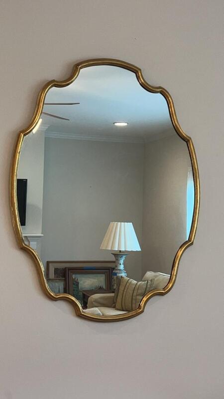 Scalloped hanging mirror