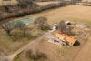 Brick Ranch on 15&plusmn; Acres with Private Pond