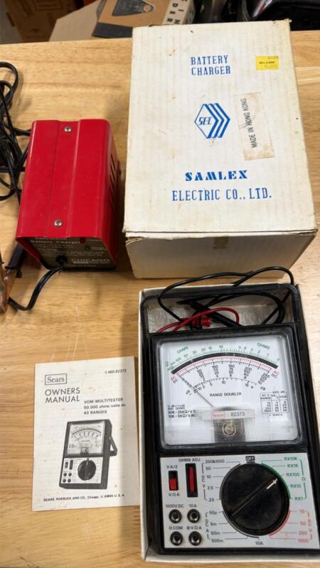 Two battery chargers, and one multi tester
