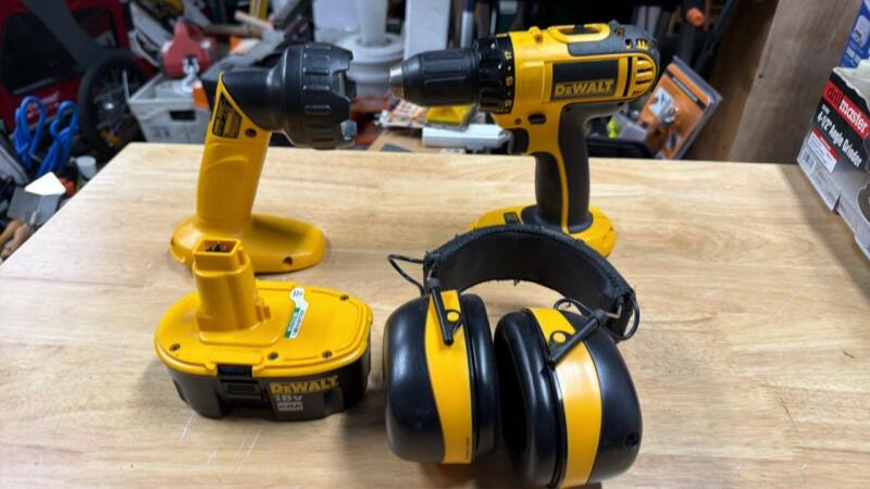 DeWalt drill, flashlight, earmuffs, and battery