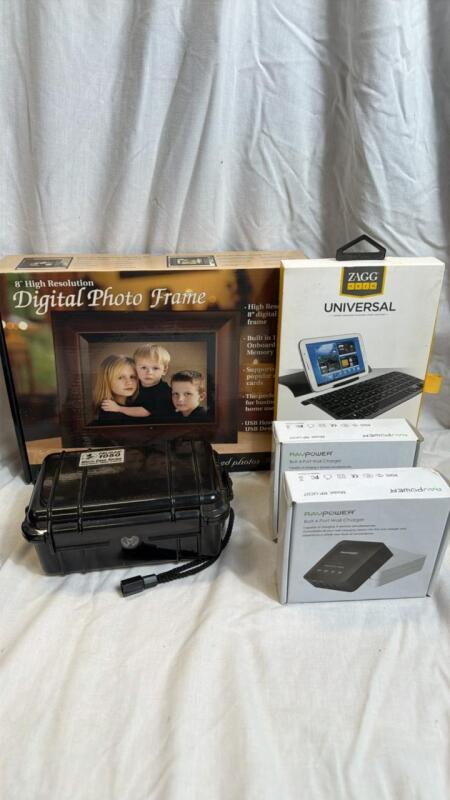 Pelican case, photo frame, keyboard, cakes, while chargers