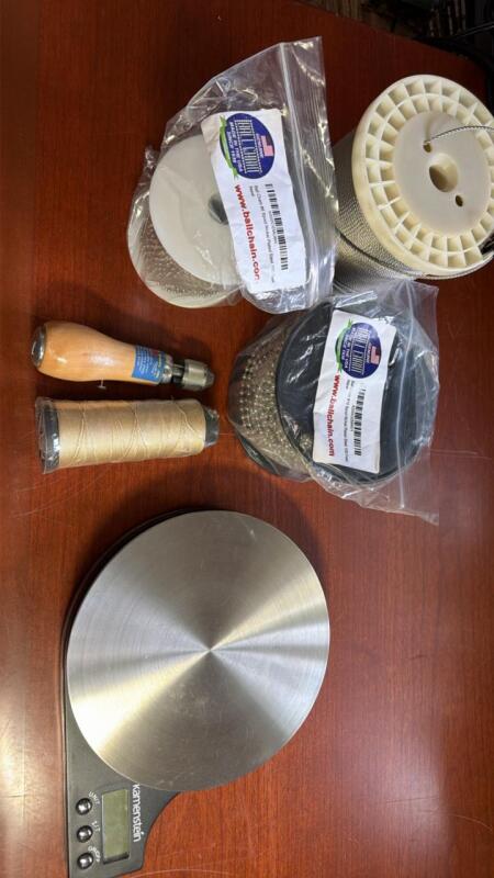 Scale, ball chain spool, and cable spool