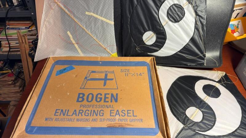 Bogen enlarging, easel portfolio, two wood boards, and three homemade kites