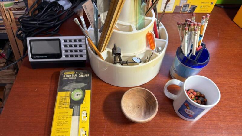 Rotating caddy with tools and miscellaneous