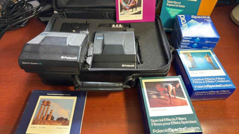 Two Polaroid Spectra system cameras with film table, tripod and filters
