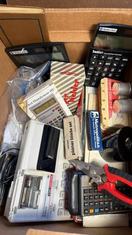 Office supplies, calculator, adding machine, stapler