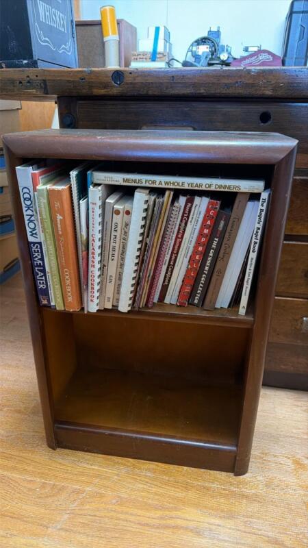 Small bookshelf with cookbooks