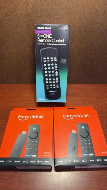 (2) fire TV sticks, and one remote control