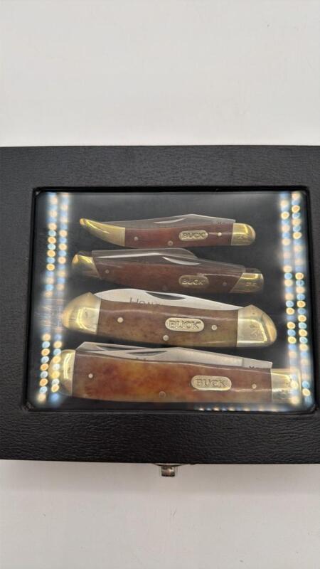 (4) Buck honeybone knives and display case