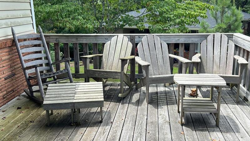 Weathered wooden Adirondack chairs