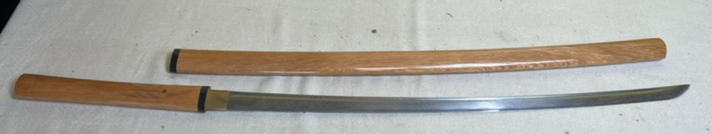 Japanese-style katana featured in a plain wood shirasaya scabbard and handle
