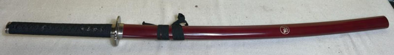 Ten Ryu Reverse Blade Katana (Sakabato) featuring a burgundy scabbard and a black cord-wrapped handle