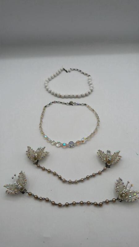 Vintage necklaces and sweater clips