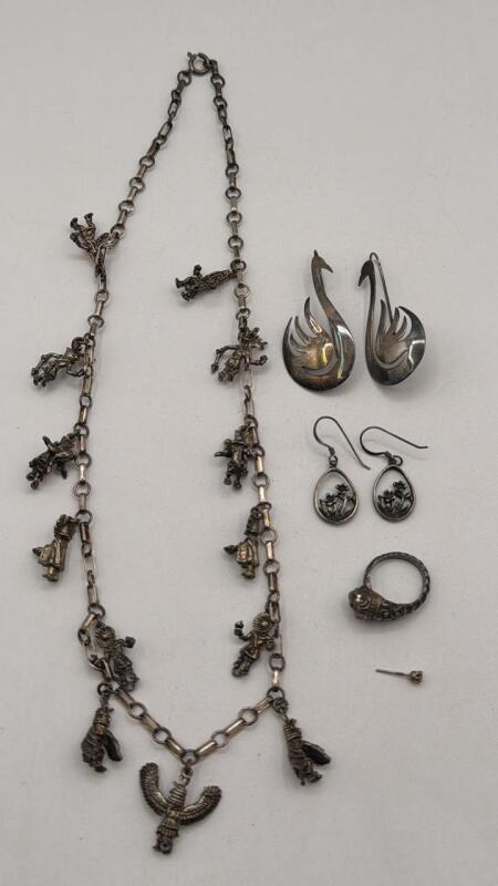Sterling Swan earrings and other unmarked necklace, ring, and earrings
